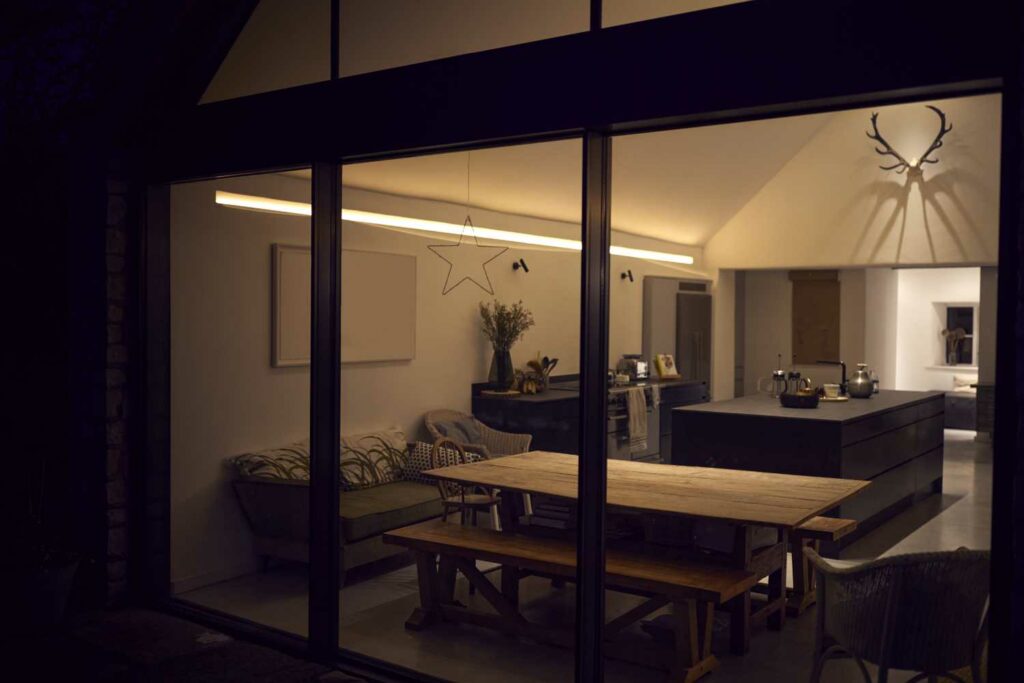 view from outside property with large beautiful side extension vaulted ceiling